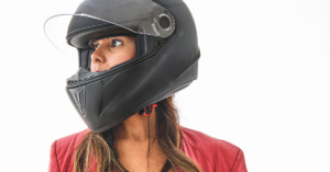 Woman wearing a motorcycle helmet