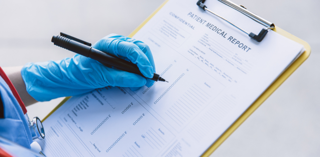 Gloved hand filling out a patient medical report on a clipboard with a pen, highlighting healthcare documentation