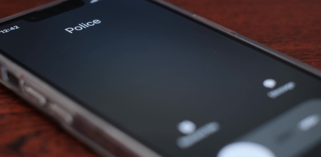 Smartphone screen showing an incoming call from Police