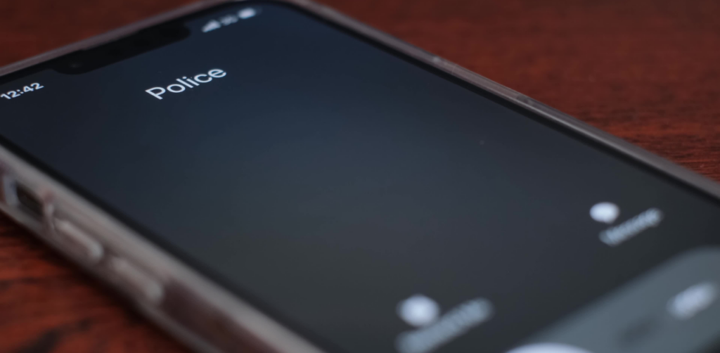 Smartphone screen showing an incoming call from Police with options to answer or decline