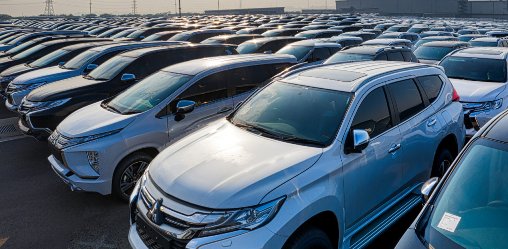 Vast lot filled with parked SUVs under the evening sun, representing the high volume of vehicles involved in car accidents in Las Vegas