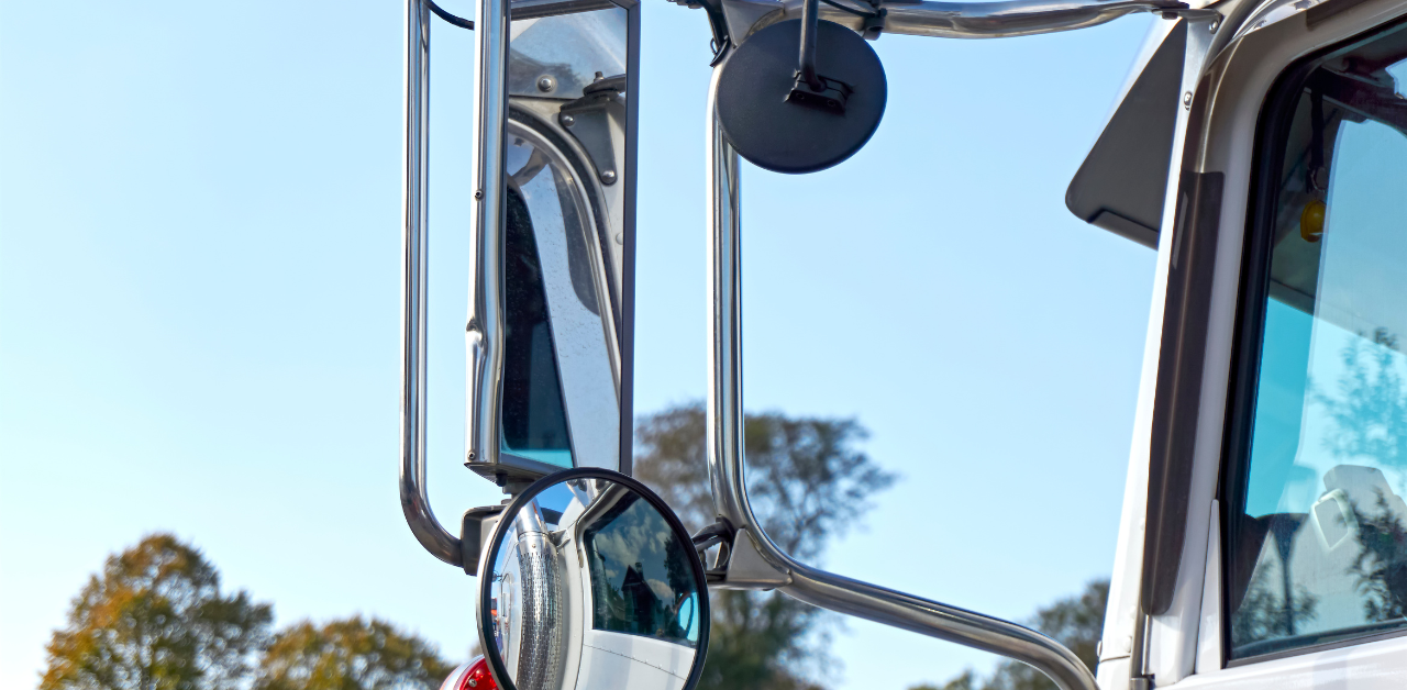 Close-up of truck mirrors stresses the role of visibility in truck driver safety