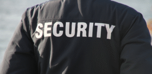Security guard jacket with bold “SECURITY” text, symbolizing safety, surveillance, and protection services