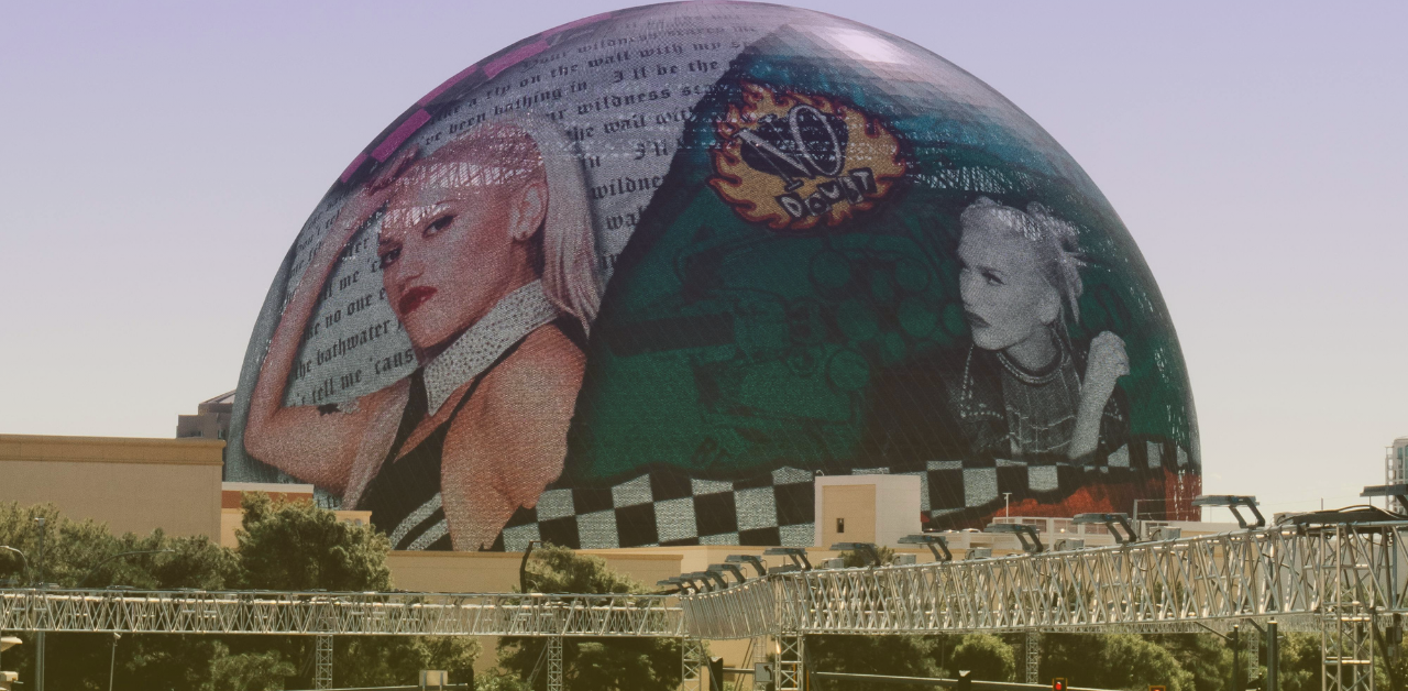 Las Vegas Sphere displaying a concert residency graphic above the monorail track